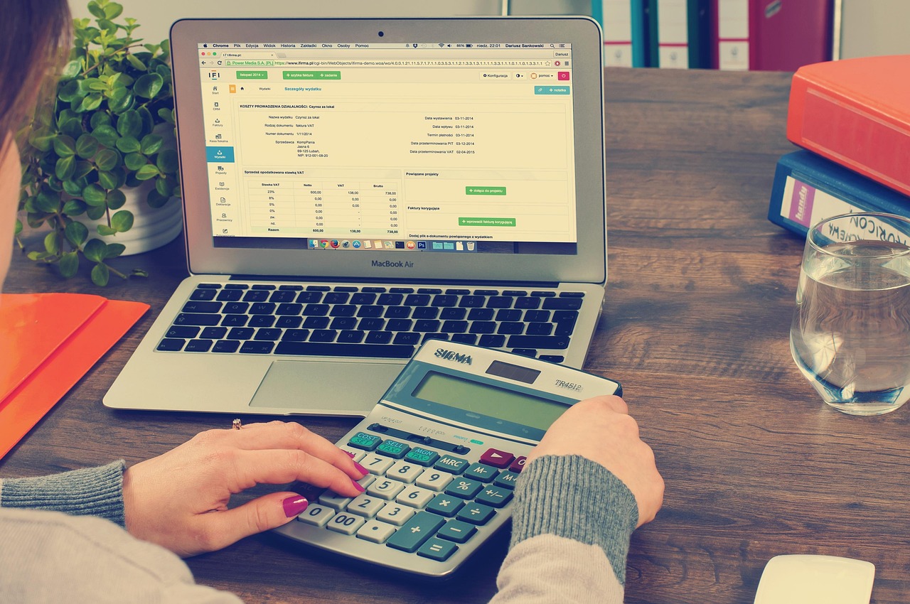 counting money and financial documents in office