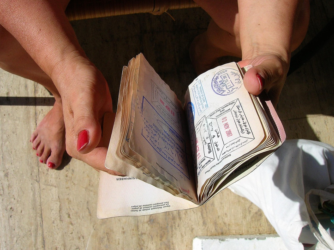 close up of passport details and visa stamp