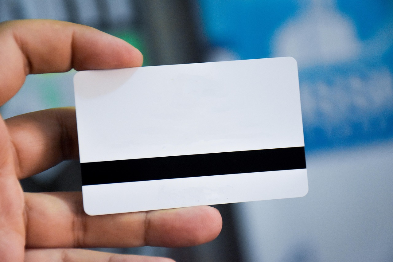 worker showing passport and ID card